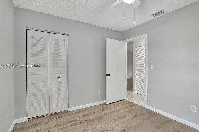 Building Photo - 9413 Boca Cove Cir