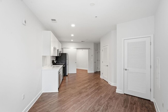 Building Photo - Experience modern living in this beautifully appointed junior one-bedroom/studio featuring an ope...