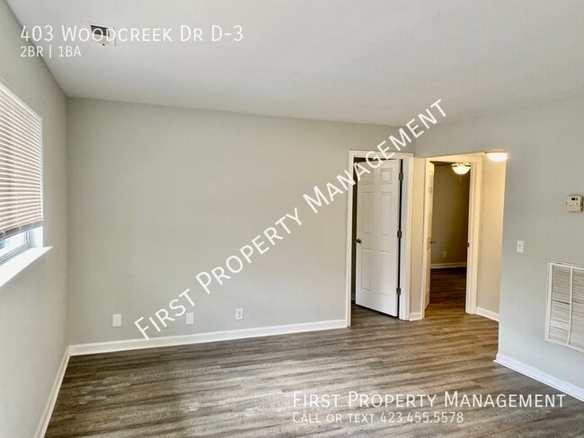 Building Photo - 403 Woodcreek Dr