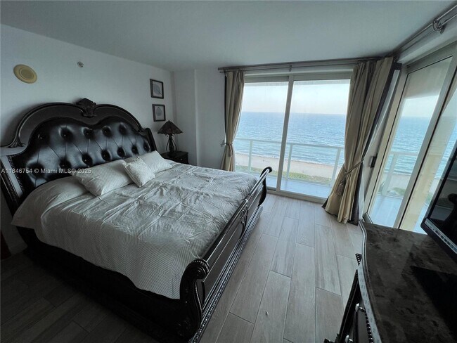 Building Photo - 9499 Collins Ave