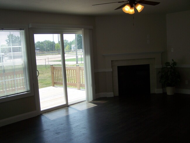 family room w/fireplace and deck - 122 Larkspur Dr