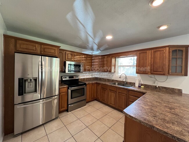 Building Photo - 6933 Javid Rd