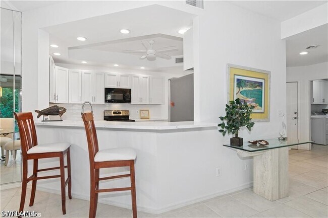 Building Photo - 7048 Pelican Bay Blvd