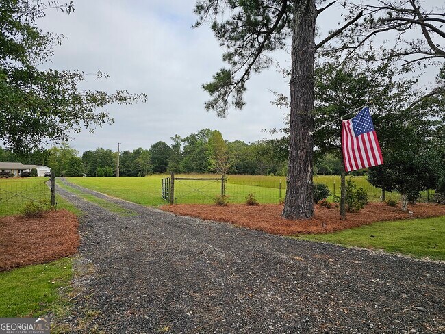 Building Photo - 6090 Strickland Town Rd