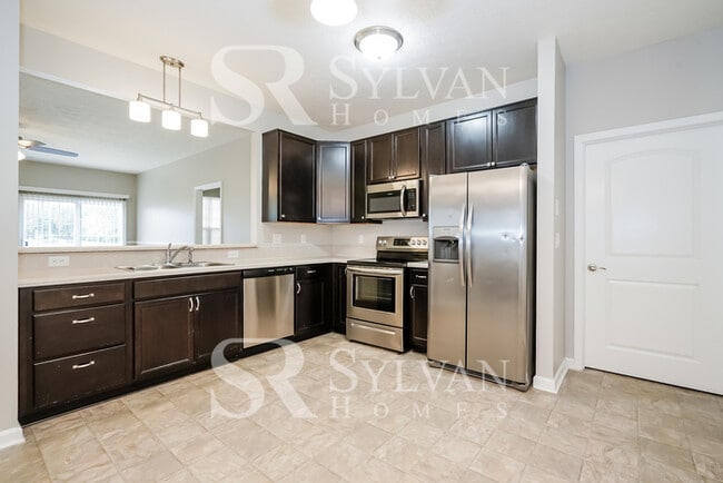 Building Photo - Turn the key. Enter. Smile. Repeat every day!