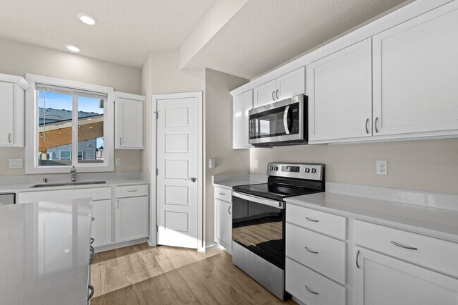 Building Photo - 2 year old 4 Bed 3 bath Liberty Lake Home offering 2330 sq/ft of living space