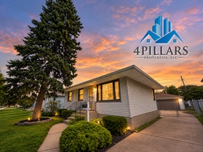 Building Photo - "Charming 3-Bedroom Haven with Finished Basement & Gleaming Hardwood Floors in Hammond!"