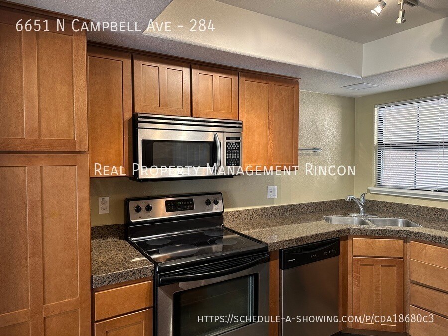 Building Photo - 6651 N Campbell Ave