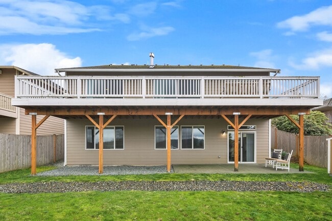 Building Photo - Water Views| Expansive Deck | Flexible Living Spaces