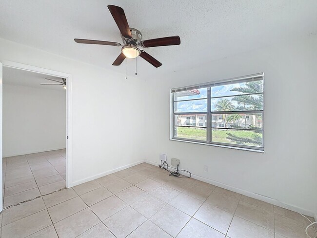 Building Photo - Desirable 55 plus community condo unit with a view of the lake on the 2nd Floor.