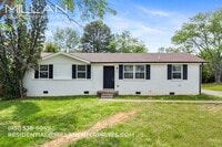 Building Photo - Renovated Home with Updated Kitchen, Open-Concept Living and Private Backyard Retreat