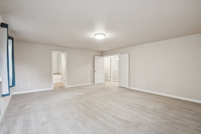 Building Photo - Well maintained 4-Bedroom 2.5 bath Graham home w/ Multiple Living Areas