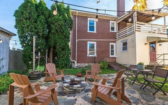 Building Photo - Spacious 4-Bedroom Home with Sunroom, Garage & Private Driveway!