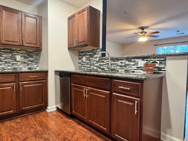 Building Photo - Beautiful, Conveninetly located First Floor Condo