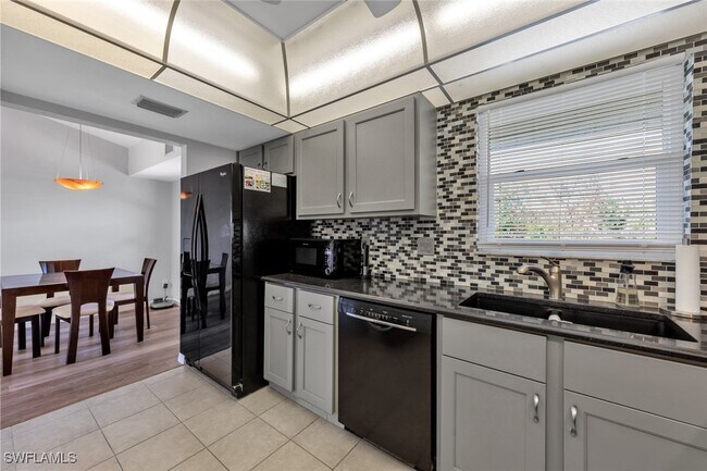 Building Photo - 12250 Tamiami Trl E