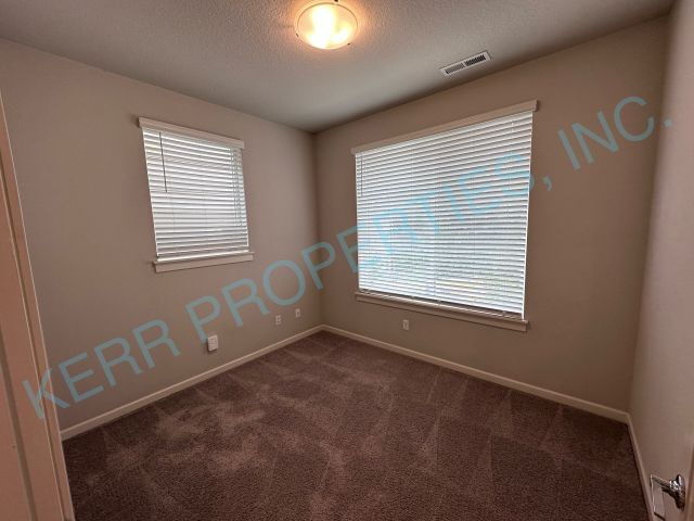 Building Photo - Spacious 3-Bedroom Townhouse with solar power in Happy Valley with 2.5 Bathrooms & 2105 Sq Ft of ...