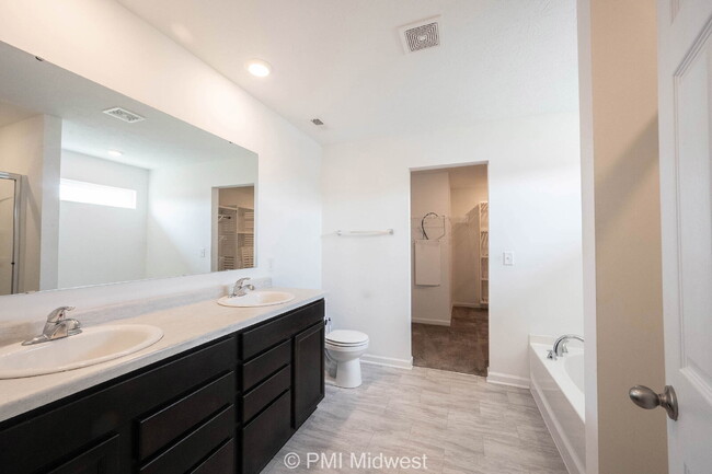 Building Photo - "Spacious 4-Bedroom Gem with 3 Full Baths ...