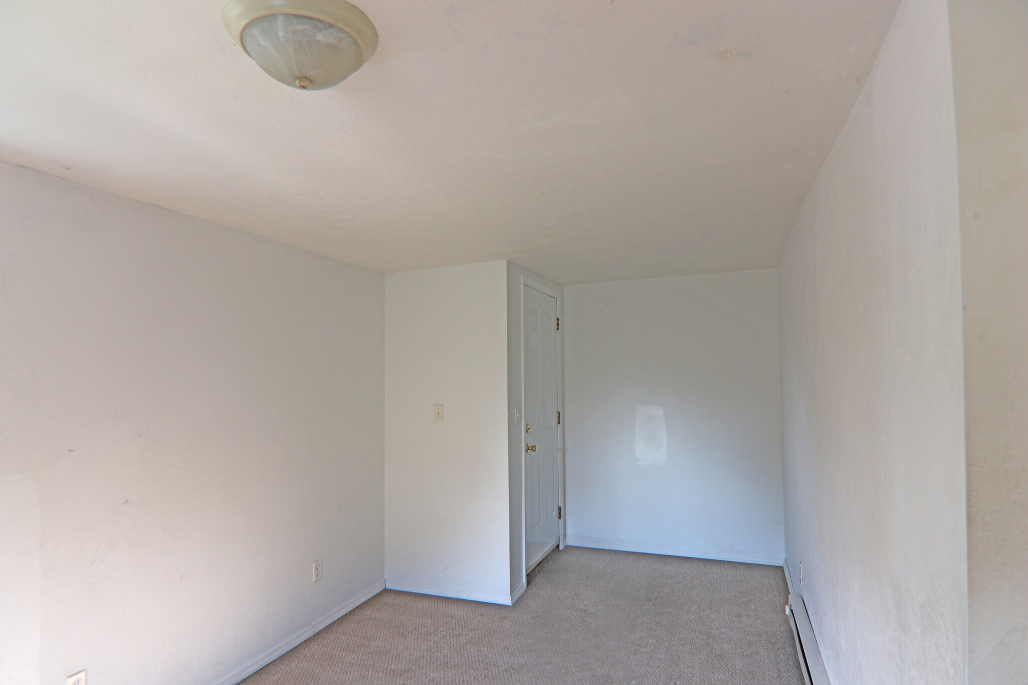 2nd floor living/common room facing west. - 348 Chittenden Ave
