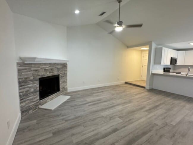 Building Photo - Totally Updated 2 Bedroom w/ Fireplace &amp; Patio-Water &amp; Lawn Care Included!