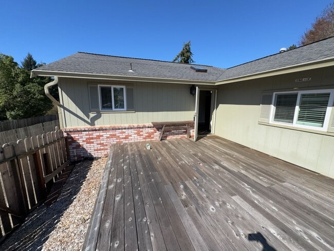 Building Photo - Newley updated 3-bedroom home features fenced yard, garage, and covered patios!