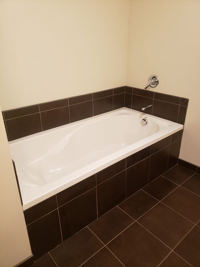 Building Photo - Wonderful Two story Penthouse Condo! Water...