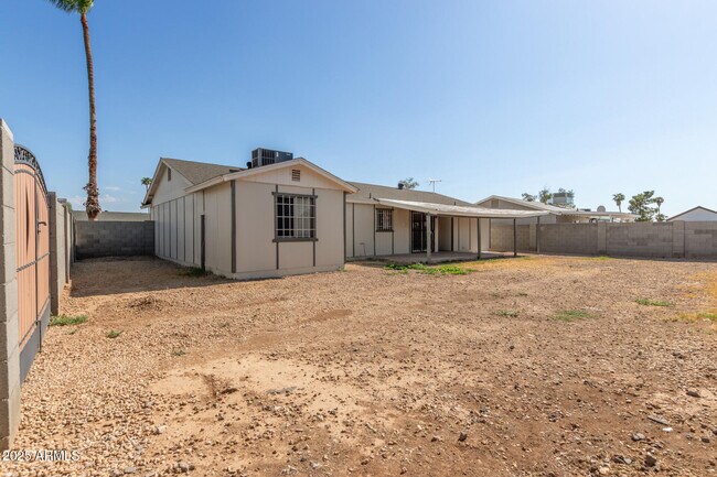 Building Photo - 7926 West Campbell Ave
