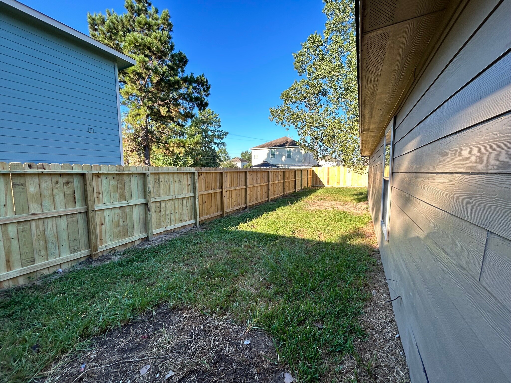 Backyard with New Fence - 16782 Fallen Timbers Dr