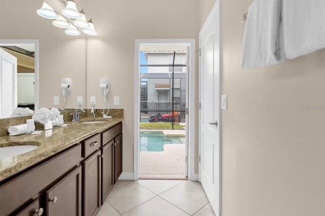 Building Photo - 8802 Bamboo Palm Ct