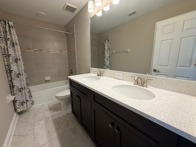 Building Photo - Brand-New 5BR/4BA Rental with Pond View, 4-Car Garage