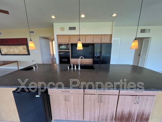 Building Photo - 77495 Cheyenne Dr