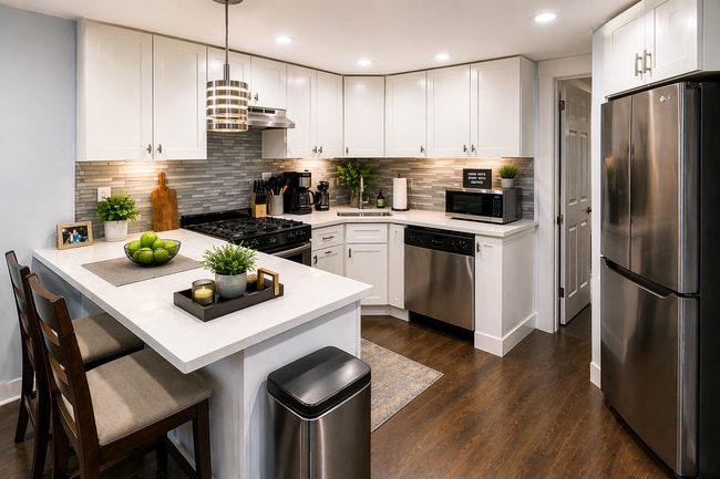 Modern kitchen with quartz counters and stainless steel appliances - 1925 Ryder St