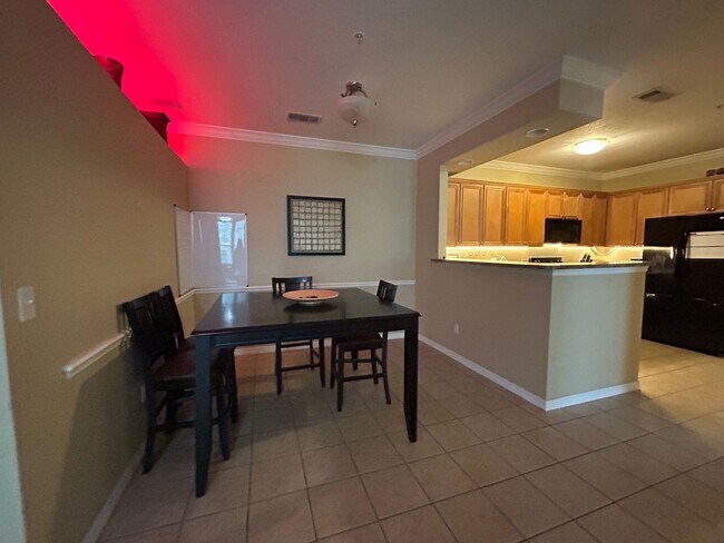 Building Photo - Walk to UF! Spacious & Furnished 3BD Condo...
