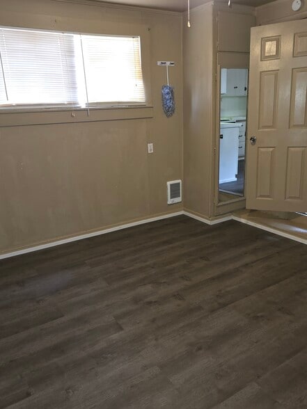 3rd BR from laundry room toward kitchen door. This room has a private entry to the bathroom & the la - 552 5th Ave W
