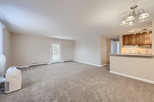 Building Photo - Top-floor, 2-bed 1-bath condo located near the highly desirable Old Town Arvada!