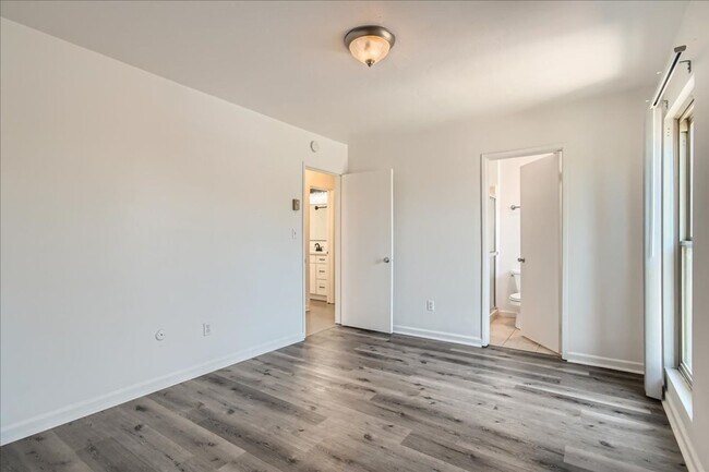 Building Photo - MOVE IN SPECIAL- Live in the Heart of Nort...