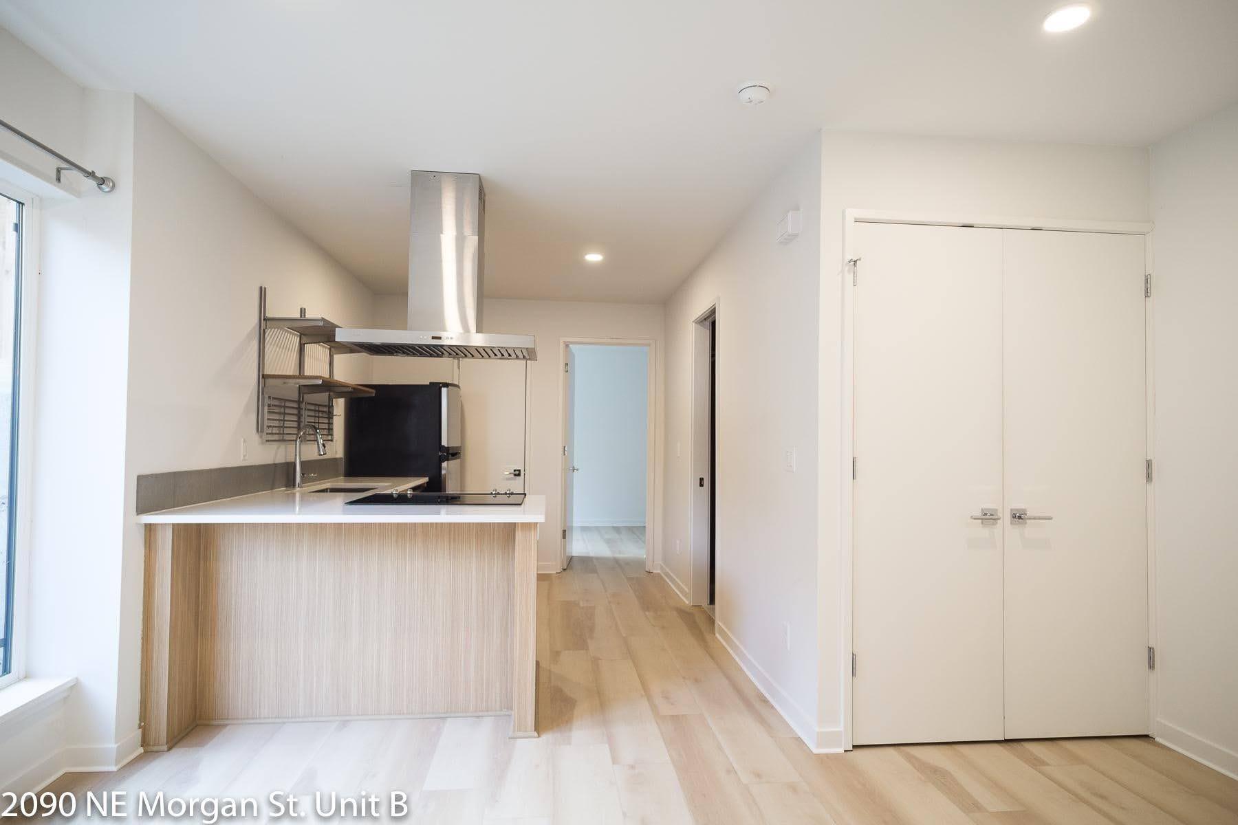 Open floor plan and lots of light! - 2090 NE Morgan St