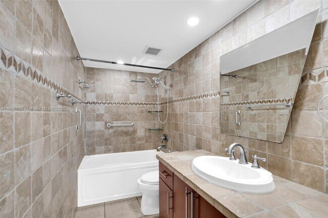Building Photo - 5401 Collins Ave
