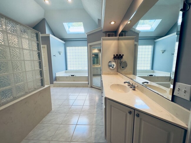 Building Photo - {6411} Enchanted Lake Estates + Updated Kitchen, Fresh Paint Throughout +  Main Floor Primary Bed...