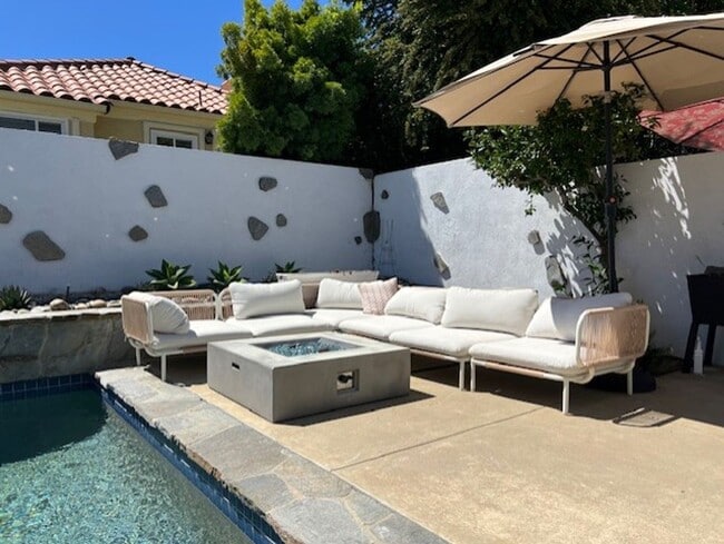 Building Photo - Coastal Elegance Meets Family Comfort in D...