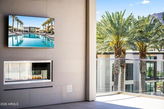 Building Photo - 6587 N Palmeraie Blvd