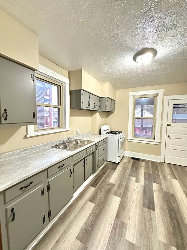 Building Photo - Updated 1 Bed/1 Bath Apartment in Greenfield - Private Deck, Central Heat & AC - Water/Sewage Inc...