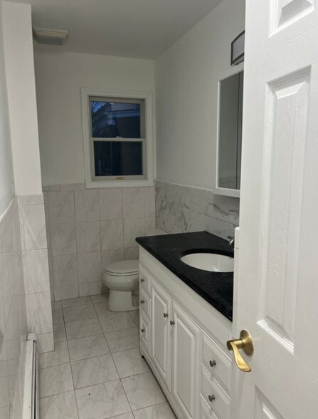 16 - First Floor Full Bathroom - 100 5th Ave
