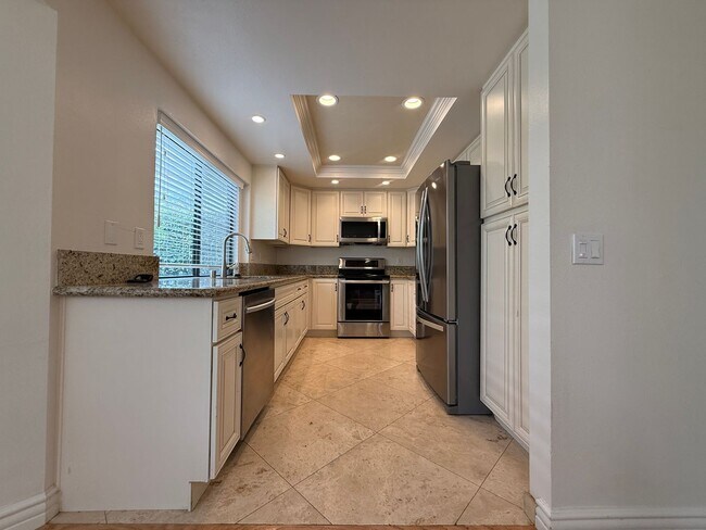 Building Photo - Spacious 4 Bedroom House with Large Fenced Yard! Landscaping Included! Two Car Garage!