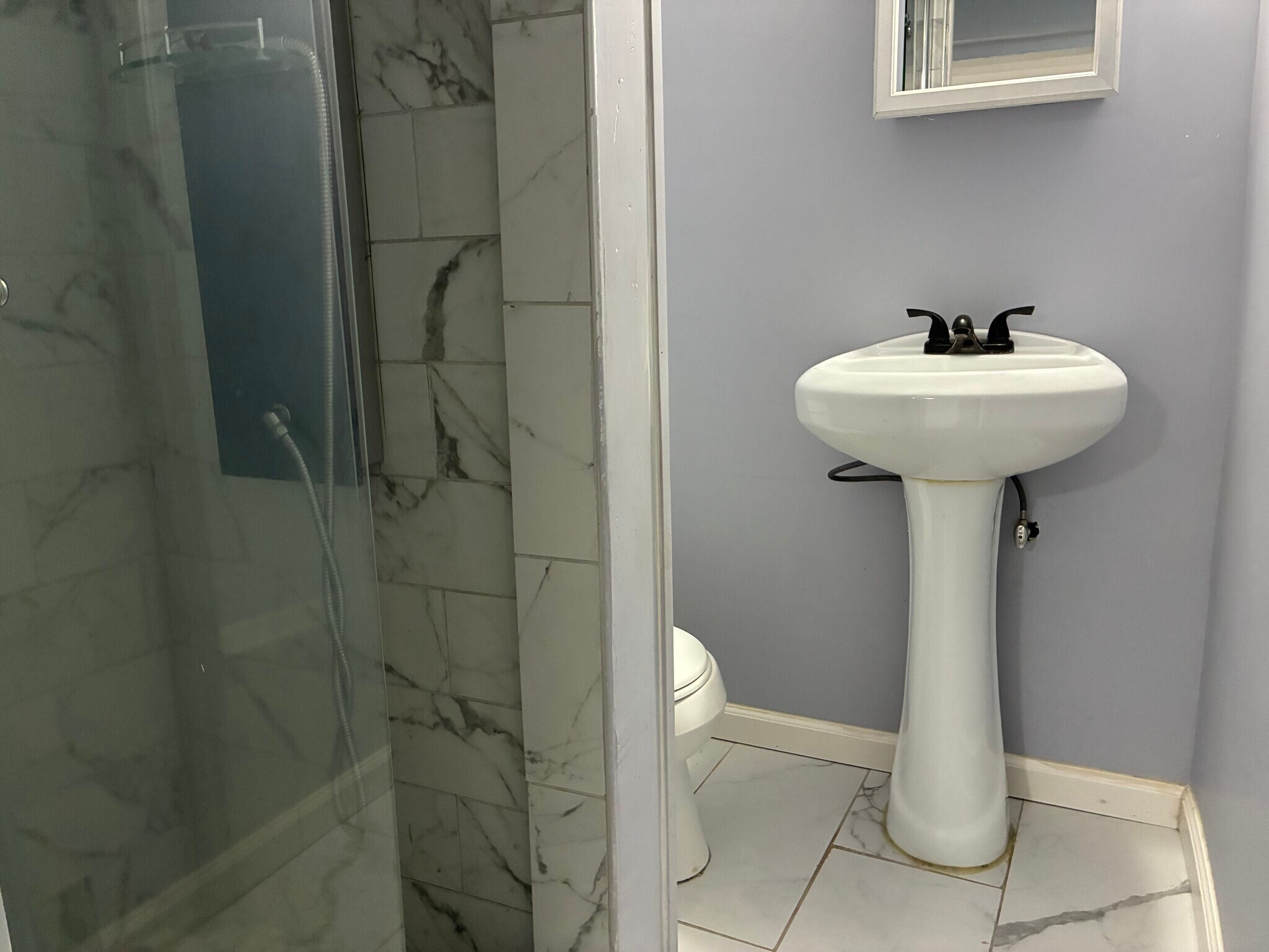 LOWER LEVEL RESTROOM - 5112 Hollywood Rd