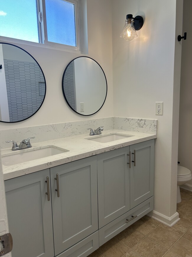 upstairs bathroom dual vanity - 11954 Eucalyptus Ave