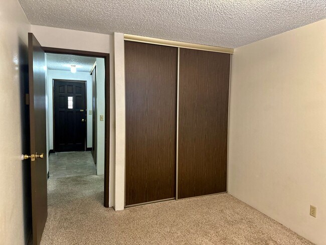 Building Photo - Hard to find 2 bdrm, 1.5 bath unit with water, sewer, and garbage.  Onsite laundry and A/C!