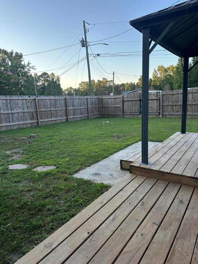 Building Photo - Move-In Ready Corner-Lot Home with Wraparound Porch Near Fort Eisenhower