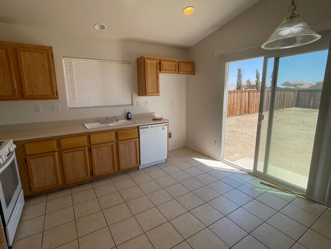 Building Photo - Adelanto Home-3 Bedrooms,2 Bathrooms, Laminate Floors, Indoor Laundry Room, Large Back Yard