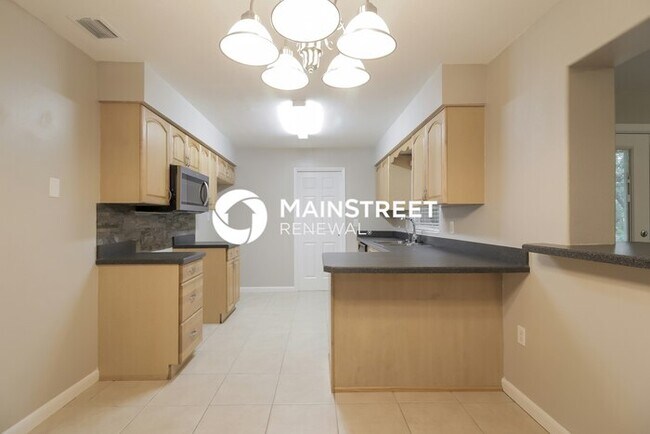 Building Photo - 4 Bedroom Pet-Friendly Home in Ocoee, FL with Main Street Renewal