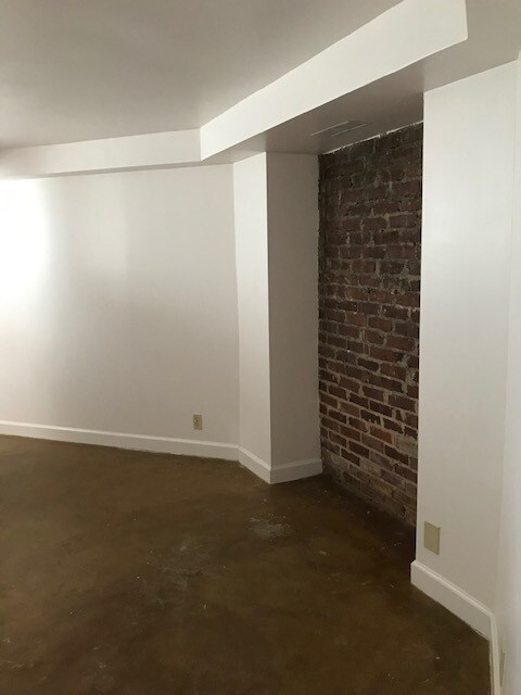 Bedroom I - this is the third of two areas with exposed brick - 87 Druid Cir NE